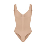 Shaped by Her Bodysuit
